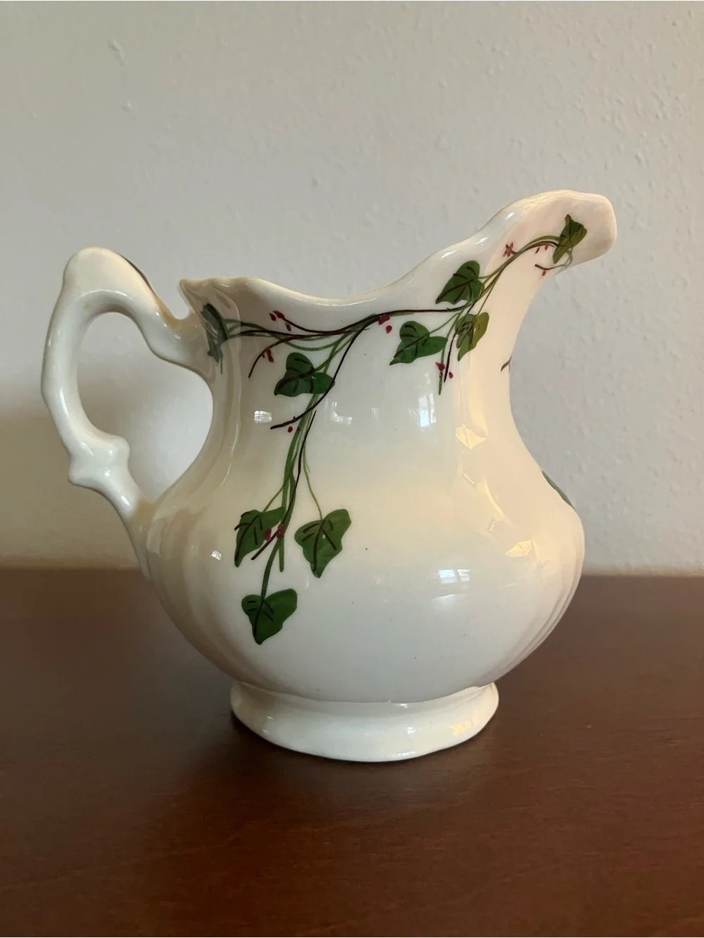 White Ceramic Creamer with Green Vine Motif